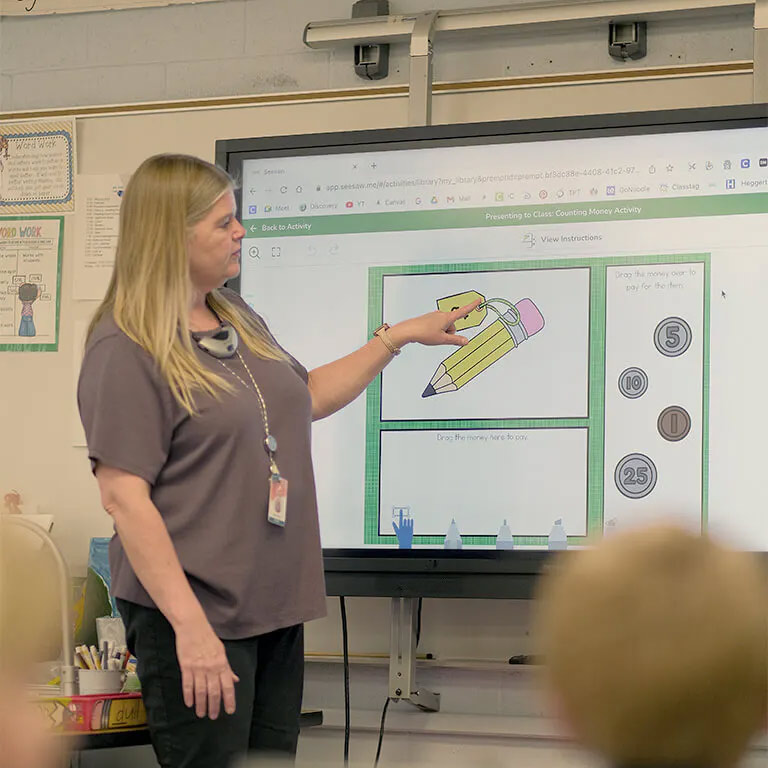 Teacher using Seesaw