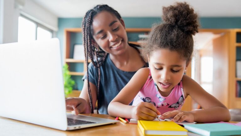 Mother and Daughter working on School work with Seesaw