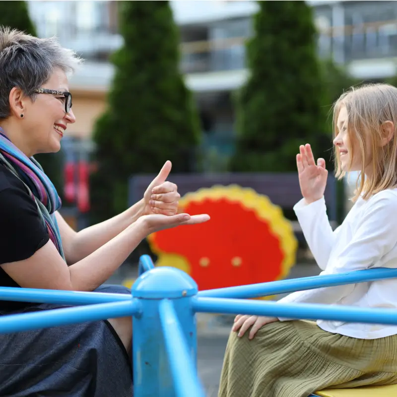 Teacher student sign language